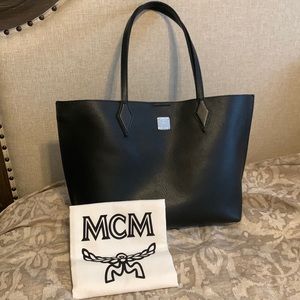 MCM Tote in black with silver inside. Absolutely Gorgeous (Like New) used once.